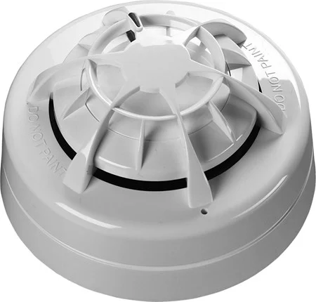 The Apollo Orbis Marine CS heat detector in white, positioned on a gray background, showcasing its essential safety design.