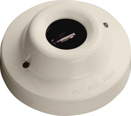 A white round light with a black base, designed for marine use as part of the Series 65 Flame Detector system.